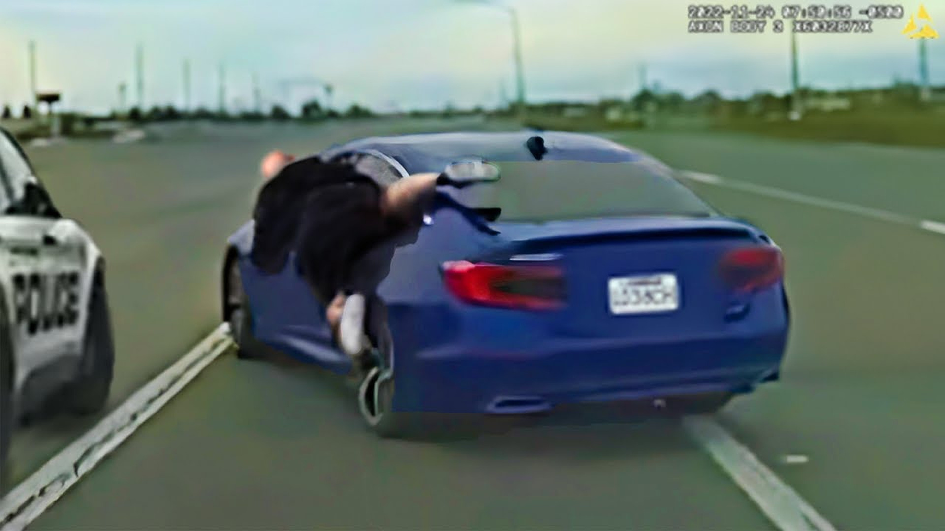 Criminal Hangs Onto Car While Fleeing Police